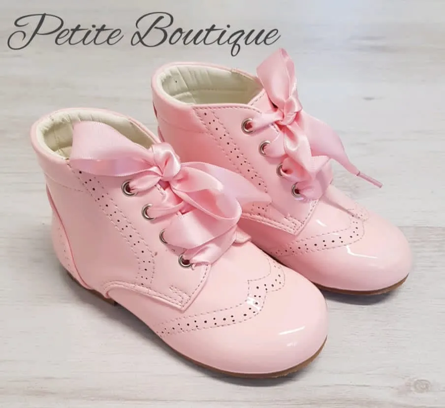 Pink patent lace boots
