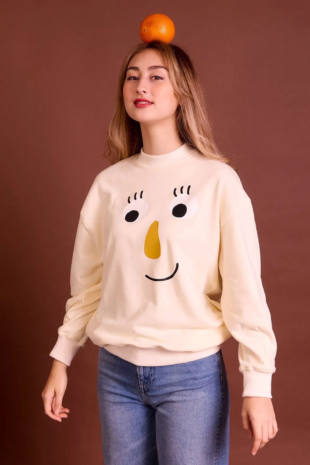 The Peep Jumper in Beige